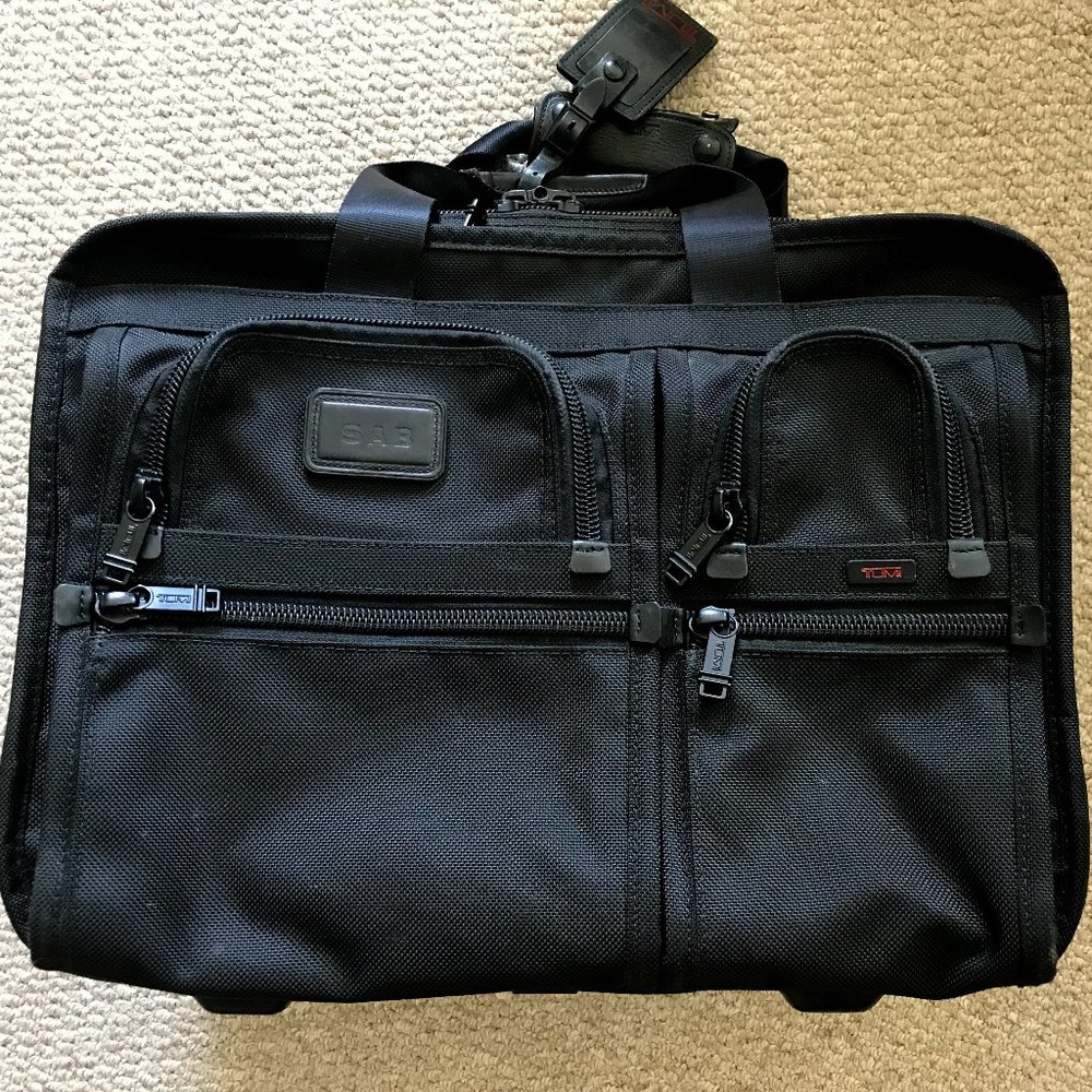 TUMI ROLLING LAPTOP BRIEFCASE